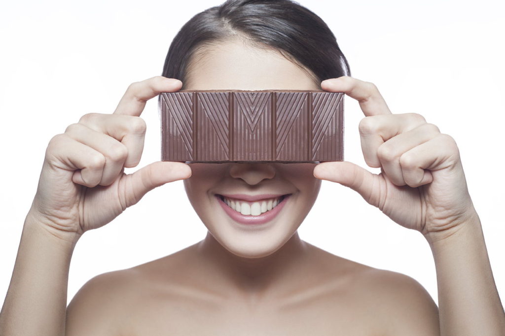 Eat dark chocolate to lift your mood and feed your skin
